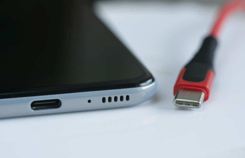 Detail of front entrance of USB versus USB-C cable plugs